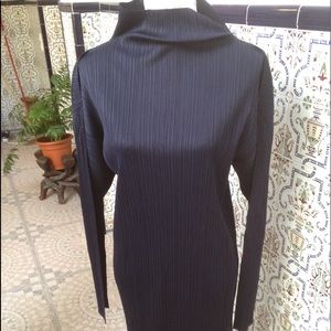 By Issey Miyake. Japanese size 5 (US12)—very roomy